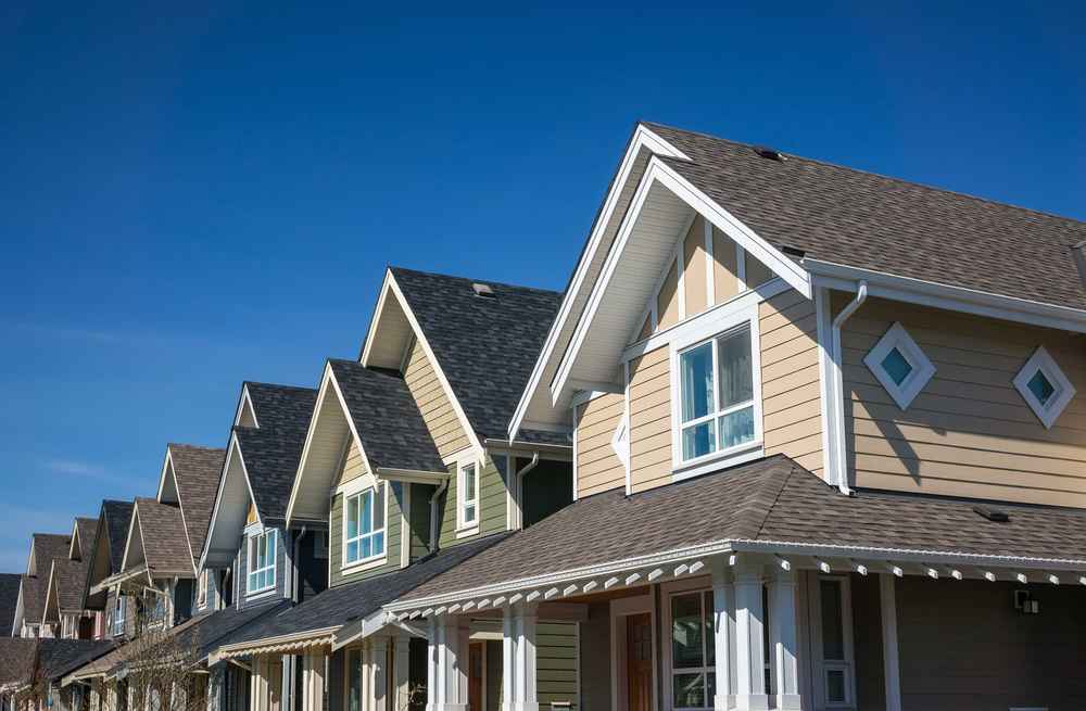 Close-up view of asphalt shingle roofing installation on a residential home